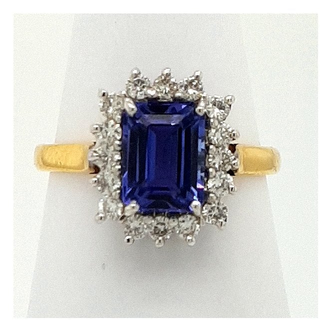Bramwells 18ct yellow gold emerald cut Tanzanite and Diamond cluster ring