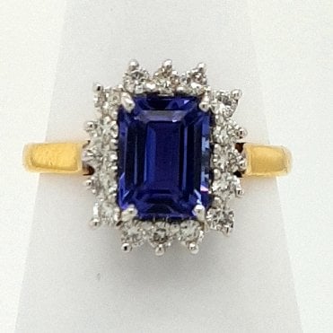 18ct yellow gold emerald cut Tanzanite and Diamond cluster ring