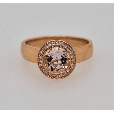 Morganite and diamond halo ring in 14 carat pink gold