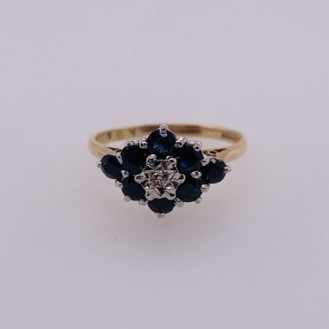 Pre-owned diamond and sapphire cluster ring 9ct yellow gold