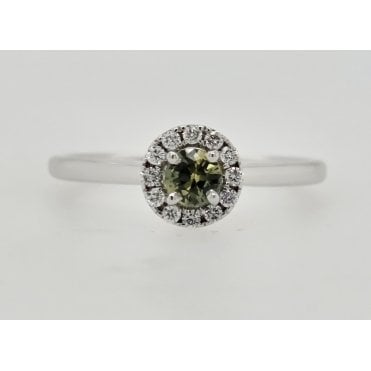 Pre-owned Green Sapphire and Diamond ring in Platinum